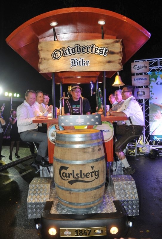 Malaysia's first-of-its-kind Oktoberfest Bier Bike was given a spin by [from left to right] Henrik Juel Andersen, Managing Director of Carlsberg Malaysia; Kai Schlickum, Vice President of Sales & Marketing of Mercedes Benz Malaysia; Kristian Dahl, Supply Chain Director of Carlsberg Malaysia; Seah Kok Leong, Chief Marketing Officer and General Manager of Magnum 4D Berhad; Peter Hourigan, General Manager and Vice President of Saujana Resort Kuala Lumpur; and Kenneth Soh, General Manager of Luen Heng Sdn Bhd.