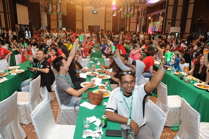  300 fans toasting to Carlsberg's 'Ultimate Football Retreat'.