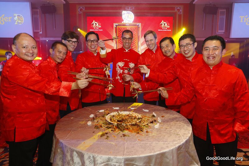 The management team of GAB tossed 'lou sang' for a prosperous Chinese New Year at Tiger Beer's "Celebration of Golden Prosperity"