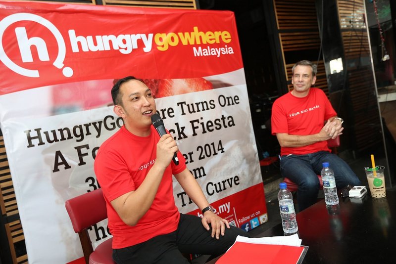 (Left) John Paul Sta Maria. Country Manager of HungryGoWhere and Matt Whittingham, CEO of HungryGoWhere introducing the new and improved website at 'HungryGoWhere Turns One - A Food Truck Fiesta'.