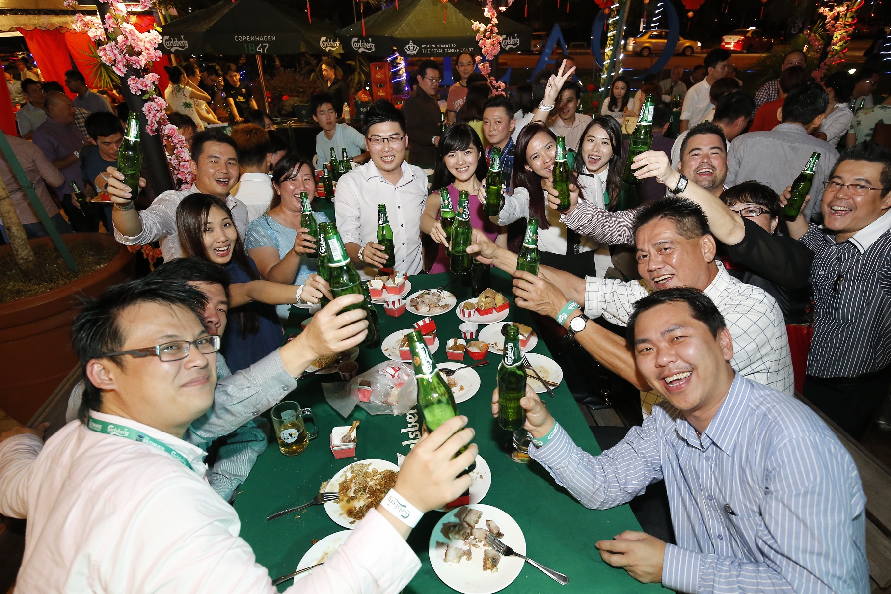 Cheers! - Guests were all smiles at the Carlsberg 2015 CNY launch.