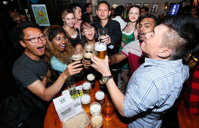 Fans at the Passport International Beerfest launch say 'cheers' to global experiences during the launch at Trec KL on Sept 22, 2016.