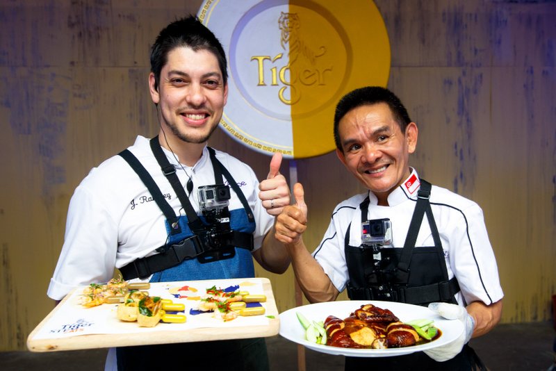 Chef Jeff Ramsey and Hawker Chan Hon Meng with their dishes at Tiger STREATS