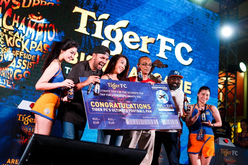 The end of the hunt for The Ultimate Fan as Tiger Beer Marketing Manager Jessie Chuah crowned winner Kumaresan Letchumanahan