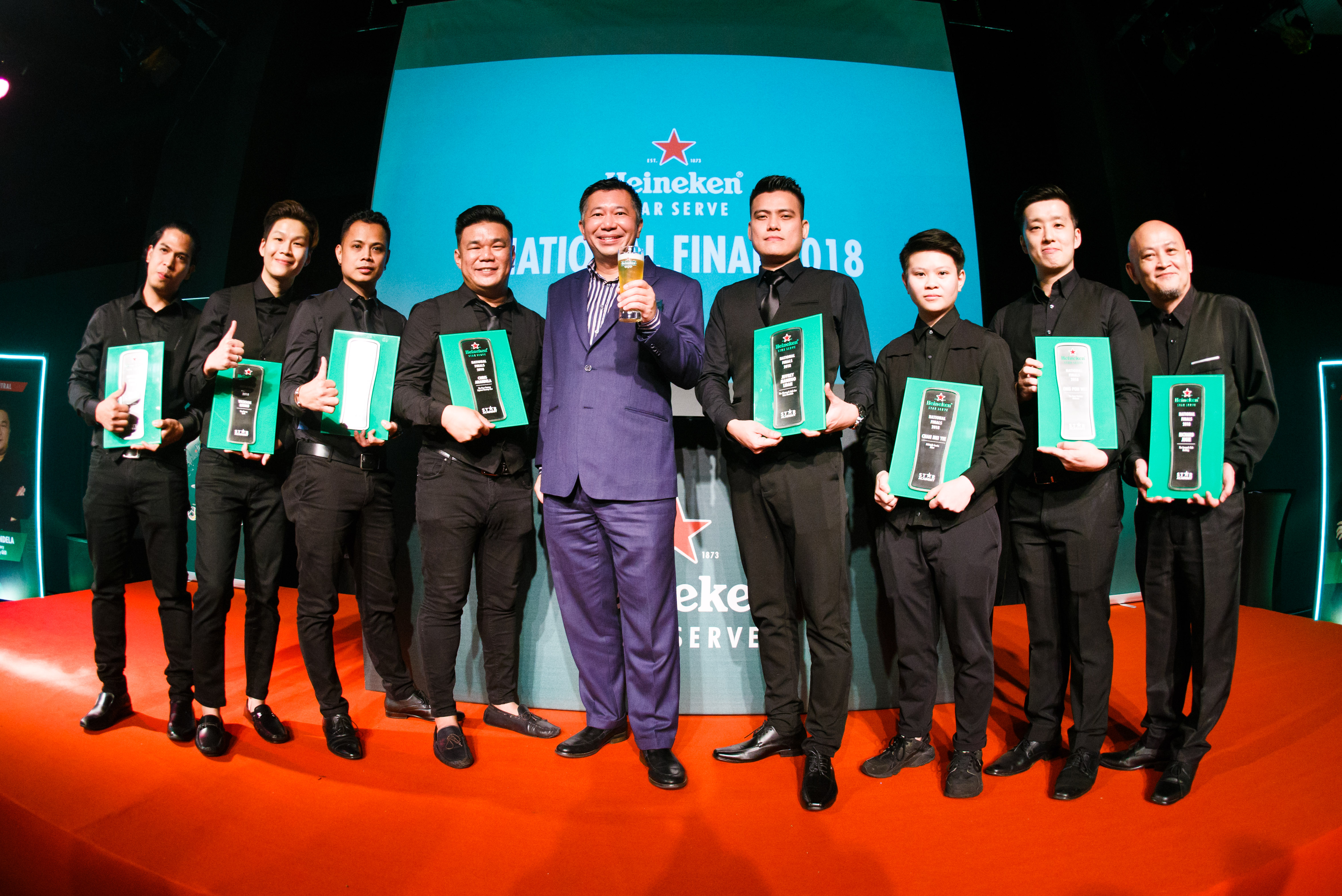 Mr. Andrew Woon, Sales Director of Heineken Malaysia Berhad, and the eight finalists during the Heineken Star Serve National Final 2018 event at Black Box, Publika